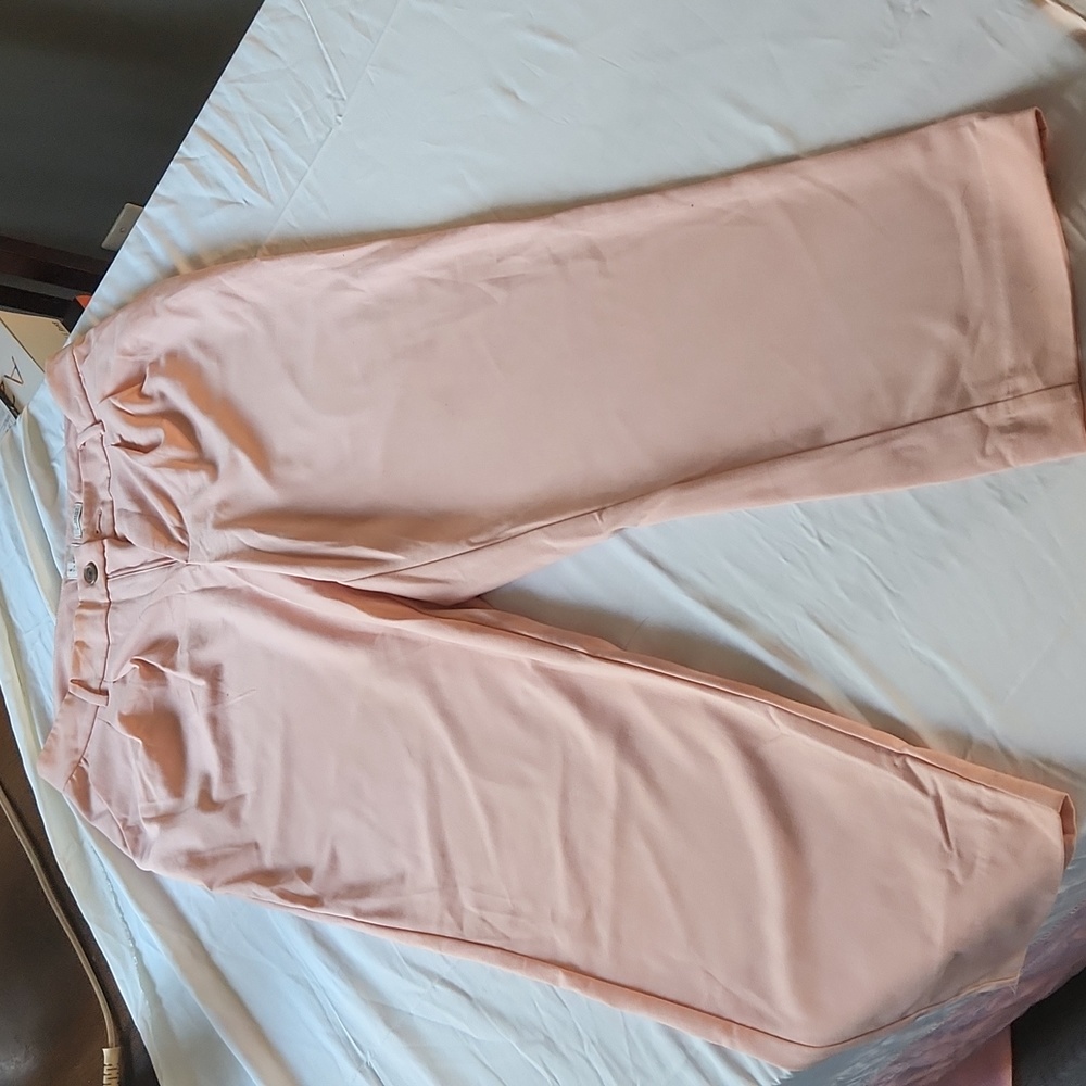 Pink slacks above anckle